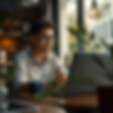 Freelancer working on a laptop at a coffee shop